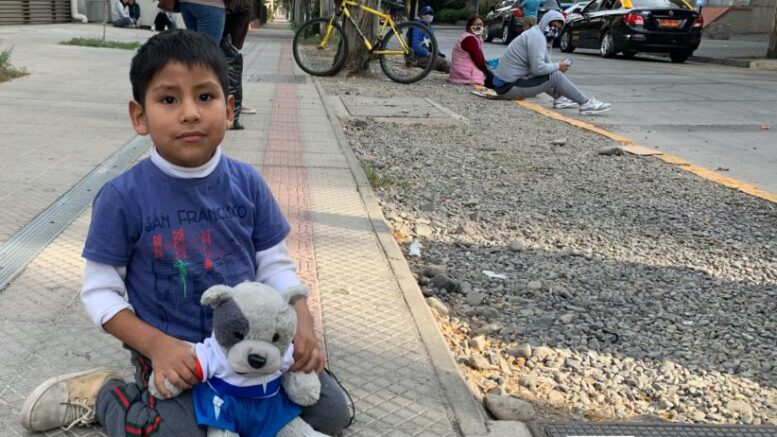 In Pics: Peruvian migrants sleeping outside embassy in Santiago de Chile